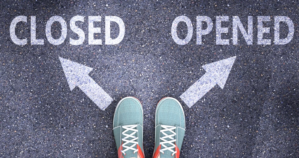 Closed and opened as different choices in life - pictured as words Closed, opened on a road to symbolize making decision and picking either Closed or opened as an option, 3d illustration